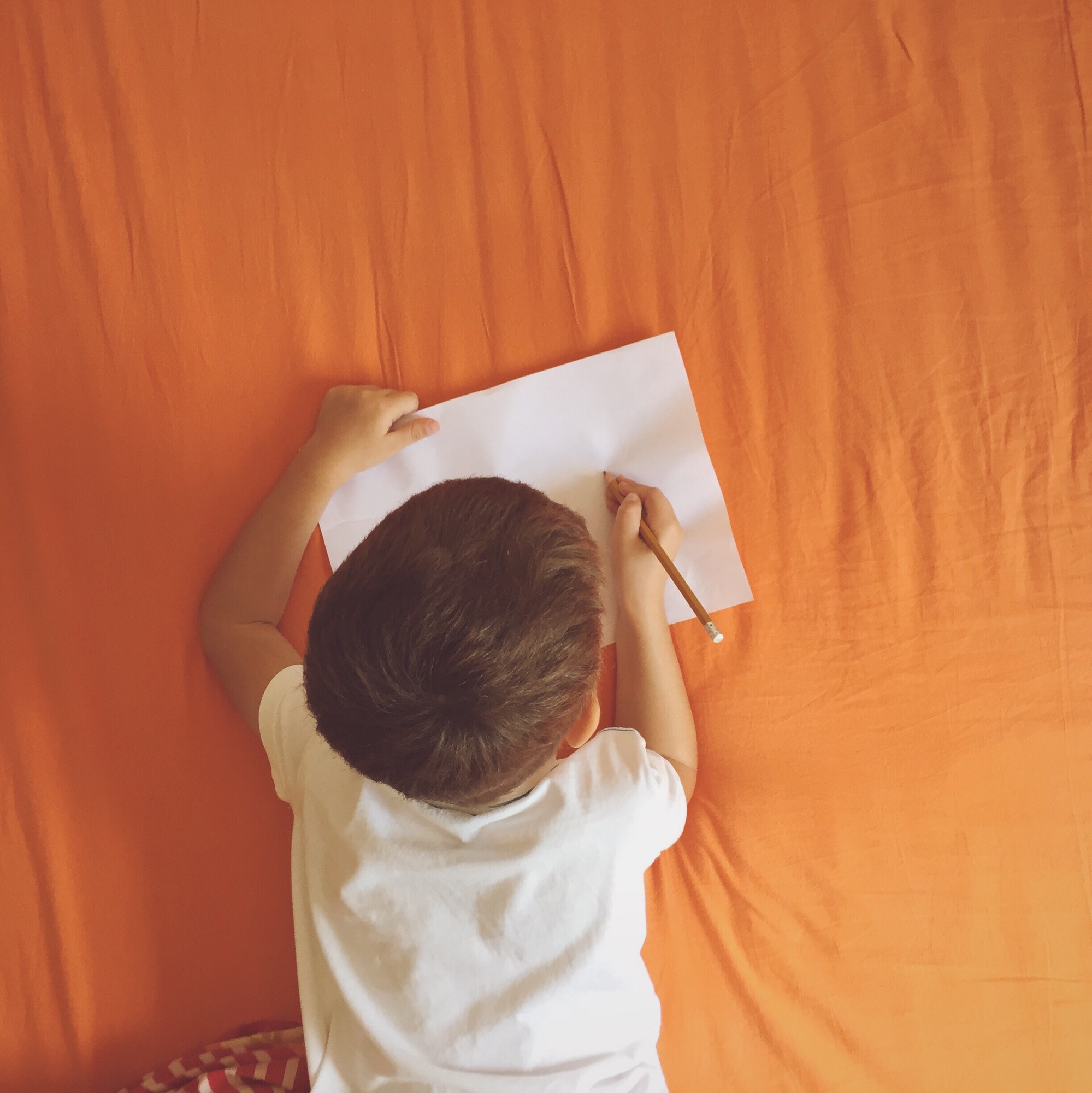 A kid writing