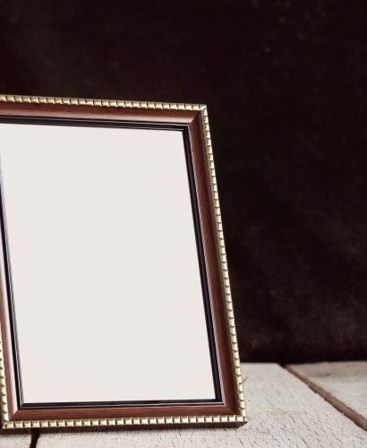 Picture frames on wooden